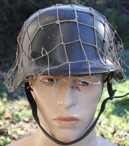 M35 COMBAT GERMAN HELMET C/W ORIGINAL NET
