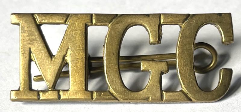 WW1 MGC (MACHINE GUN CORPS) SHOULDER TITLE