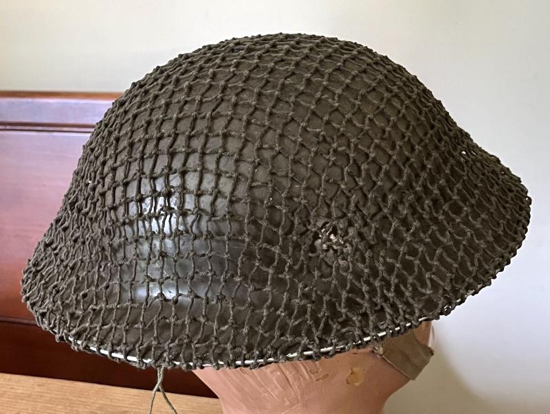 EARLY WW2 BRITISH TOMMY HELMET WITH NET & NAMED